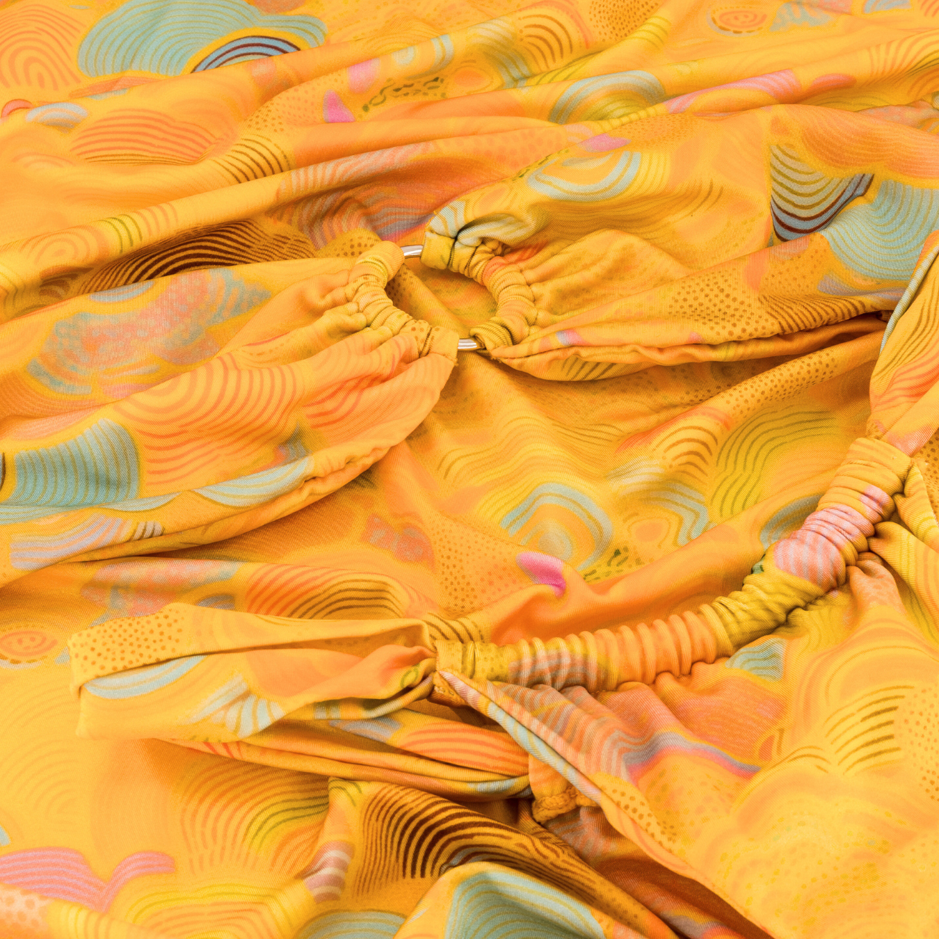 A sunset orange bikini with a shell print