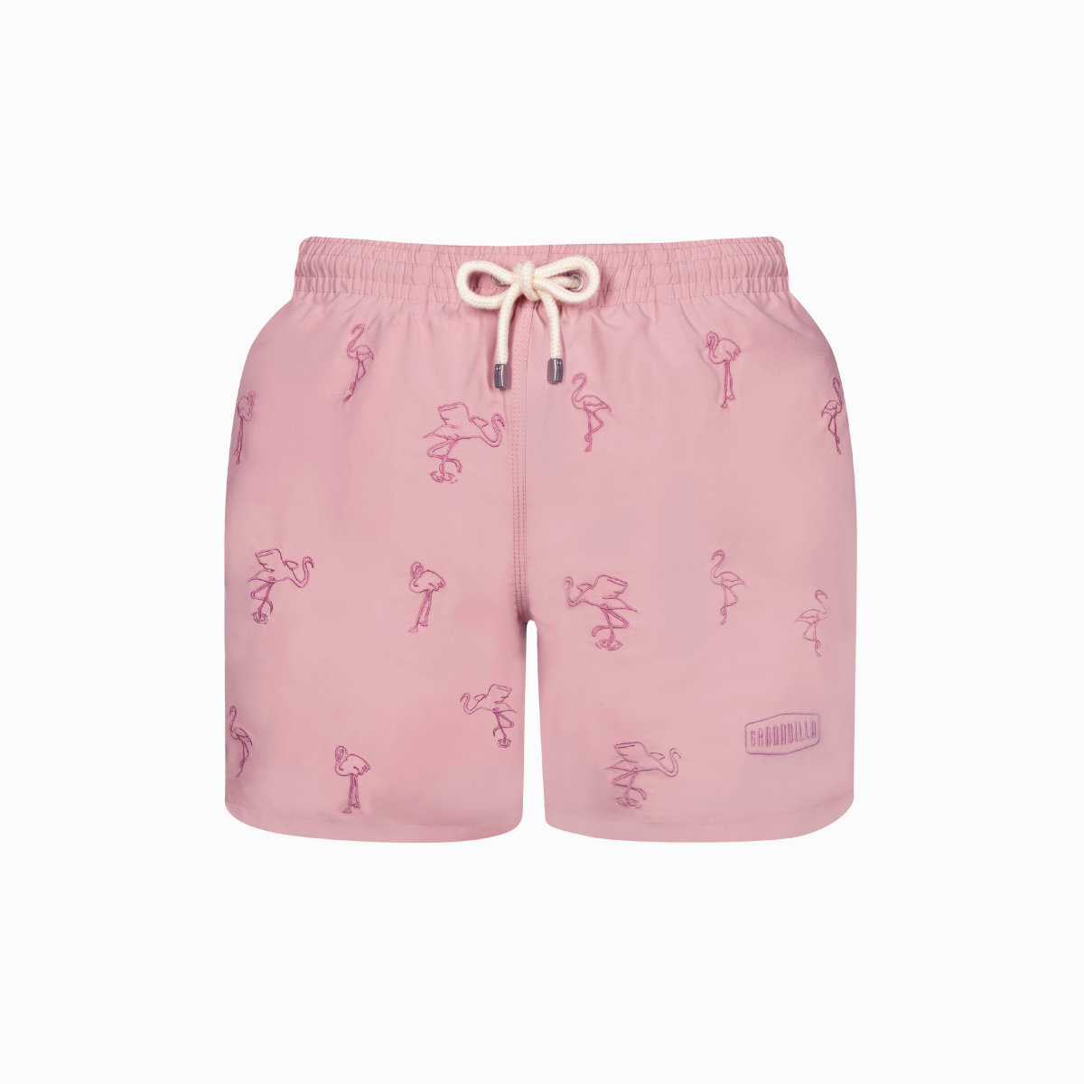 Pink swim shorts with embroidered flamingos.
