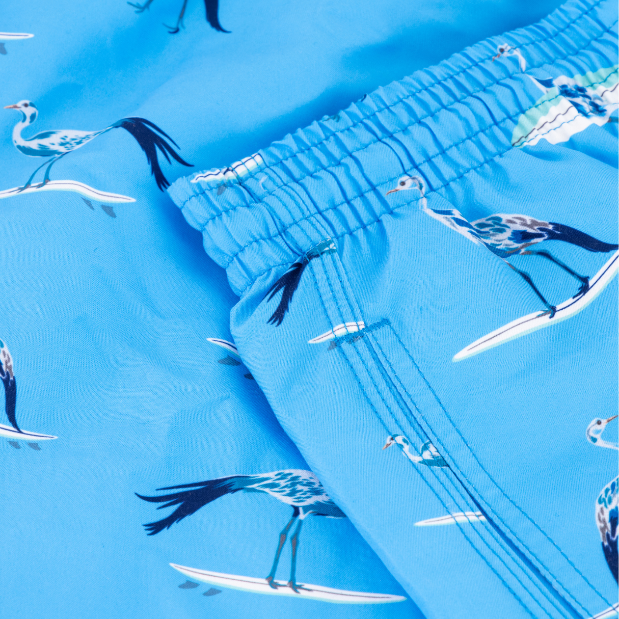 Mid-length Swim Shorts | Crane Surfer / Light Blue